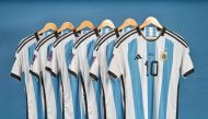 This undated photo courtesy of Sotheby's shows Lionel Messi's set of six match worn shirts from the 2022 FIFA World Cup. (Photo by SOTHEBY'S / AFP)