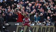 West Ham United's Ghanaian midfielder #14 Mohammed Kudus (C) celebrates after scoring their second goal during the English Premier League football match between West Ham United and Manchester United at the London Stadium, in London on December 23, 2023. (Photo by Ben Stansall / AFP)