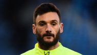 Tottenham Hotspur's French goalkeeper Hugo Lloris reacts as he warms up prior to the English Premier League football match on April 3, 2023. (Photo by Peter Powell / AFP)