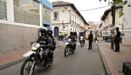 Ecuadorean security forces patrol the area around the main square and presidential palace after Ecuadorean President Daniel Noboa declared the country in a state of 