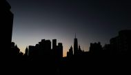 High-rise buildings are pictured at dusk in the Manhattan borough of New York city on January 14, 2024. (Photo by Charly TRIBALLEAU / AFP)
