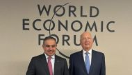 Minister of Finance H E Ali bin Ahmed Al Kuwari with Executive Chairman of the World Economic Forum Professor Klaus Schwab.