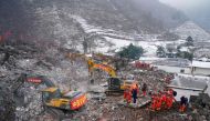 Rescue workers search for missing victims at a landslide site in southwestern China's Yunnan province on January 23, 2024. (Photo by CNS / AFP) 
