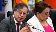 Colombia's President Gustavo Petro (L) speaks next to Honduras' President Xiomara Castro during the CELAC Summit in Buccament Bay, Saint Vincent and the Grenadines on March 1, 2024. (Photo by Randy Brooks / AFP)
