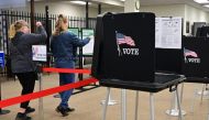 People arrive to cast their ballots at the Shasta County Clerk & Registrar of Voters offices on February 23, 2024 in Redding in Northern Califonia's Shasta County.  (Photo by Frederic J. BROWN / AFP)
