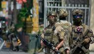 Canadian soldiers stand guard in front of their embassy in Port-au-Prince, Haiti, on March 28 2024.  (Photo by Clarens Siffroy / AFP)
