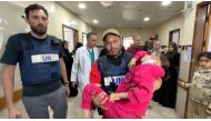 WHO and UN evacuate a 12-year-old child from Kamal Adwan hospital in northern Gaza on march 28, 2024.  
