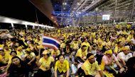 (FILES) This file picture taken on November 25, 2008 shows anti-government protesters shouting slogans during a protest at Suvarnabhumi international airport in Bangkok. (Photo by PORNCHAI KITTIWONGSAKUL / FILES / AFP)
