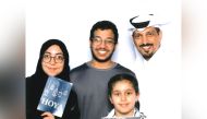 Hussein Aldobashi with his family .