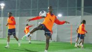 Al Duhail's Almoez Ali (centre) trains with teammates.
