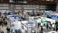 This file photo taken on May 10, 2023 shows a general view of exhibitors at various booths during the three-day 7th AI Expo, part of NexTech Week Tokyo 2023, Japan's largest trade show for artificial intelligence technology companies, at Tokyo Big Sight. Photo by Richard A. Brooks / AFP