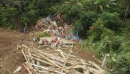 This handout photo released on April 14, 2024 by the National Search and Rescue Agency (BASARNAS) shows a landslide site in Tana Toraja, South Sulawesi. (Photo by Handout / BASARNAS / AFP) 