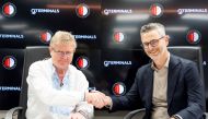 Neville Bissett, Group CEO of QTerminals, and Ruud van der Knaap, Feyenoord’s CCO, at the ceremony.