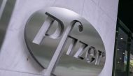 (FILES) The Pfizer Inc. logo on July 22, 2020 in New York City. Pfizer has received US approval for a gene therapy against a form of hemophilia, a rare and inherited blood clotting disorder, the company said on April 26, 2024. (Photo by Jeenah Moon / GETTY IMAGES NORTH AMERICA / AFP)
