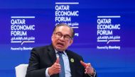 Malaysia's Prime Minister Anwar Ibrahim speaks at the Qatar Economic Forum in Doha on May 14, 2024. (Photo by Karim Jaafar / AFP)