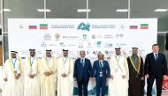 Minister of Awqaf and Islamic Affairs H E Ghanem bin Shaheen Al Ghanim (centre) and  Tatarstan’s President H E Rustam Minnikhanov (first right)  along with officials during the forum.    