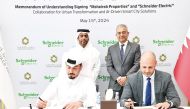 Msheireb Properties and Schneider Electric officials during the signing ceremony.