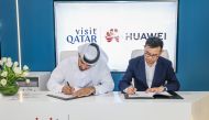 Engr. Abdulaziz Ali Al Mawlawi, Chief Executive Officer of Visit Qatar, and Justin Chen, Global President of Petal Ads, Huawei Consumer Cloud, signing the MoU.