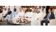 Minister of Awqaf and Islamic Affairs H E Ghanem bin Shaheen bin Ghanem Al Ghanim (third right) and other officials and guests at the event. 
