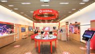 Inside view of a Vodafone retail store.