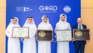 Dr. Yousef Alhorr, Founding Chairman of GORD, Eng. Ali Al Khalifa, Chief Executive Officer for Zones Development at QFZ, with other officials during the awarding ceremony.