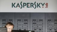 File photo: An employee works near screens in the virus lab at the headquarters of Russian cyber security company Kaspersky Labs in Moscow July 29, 2013. Reuters/Sergei Karpukhin
