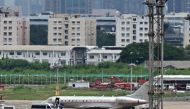 An airplane carrying Wikileaks founder Julian Assange pictured on the tarmac at Don Mueang International Airport in Bangkok on June 25, 2024. (Photo by Manan Vatsyayana / AFP)
