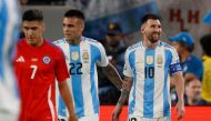 Argentina's forward #10 Lionel Messi (R) and Argentina's forward #22 Lautaro Martinez react at the end of the Conmebol 2024 Copa America tournament group A football match on June 25, 2024. (Photo by Eduardo Munoz / AFP)