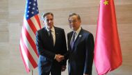 US Secretary of State Antony Blinken (L) shakes hands with China's Foreign Minister Wang Yi on July 27, 2024. (Photo by Achmad Ibrahim / POOL / AFP)
