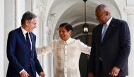 Philippines' President Ferdinand Marcos Jr. (C) talks to US Secretary of State Antony Blinken (L) and US Secretary of Defense Lloyd Austin during a courtesy visit at the Malacanang Palace in Manila on July 30, 2024. (Photo by Francis R. Malasig / Pool / AFP)