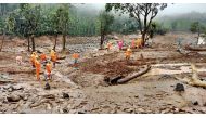 In this handout photograph taken on August 2, 2024 and released by India's National Disaster Response Force (NDRF), relief personnel conduct a search and rescue operation after the landslides in Wayanad. Photo by National Disaster Response Force (NDRF) / AFP