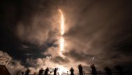 A SpaceX Falcon 9 rocket with the Crew Dragon Resilience capsule, carrying the crew of the Polaris Dawn Mission, lifts off from Launch Complex 39A at Kennedy Space Center in Cape Canaveral, Florida, on September 10, 2024. (Photo by CHANDAN KHANNA / AFP)
