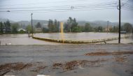 An athletic field is flooded after heavy rain and filling with debris on September 27, 2024 in Boone, North Carolina. Melissa Sue Gerrits/Getty Images/AFP 
 