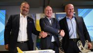 From L-R: Benoit de Saint-Exupery, Airbus executive vice president for commercial aircraft sales, Cebu Pacific chief executive Michael Szucs, and Pratt & Whitney president for commercial engines Rick Deurloo pose during a signing ceremony in Manila on October 2, 2024. Photo by Ted ALJIBE / AFP