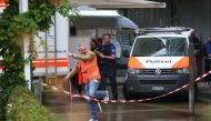 Police officers are seen outside of a daycare centre where a man attacked several children injuring three, before being arrested, in Zurich, Switzerland, on October 1, 2024. Photo by ARND WIEGMANN / AFP