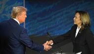 US Vice President and Democratic presidential candidate Kamala Harris (R) shakes hands with former US President and Republican presidential candidate Donald Trump during a presidential debate at the National Constitution Center in Philadelphia, Pennsylvania, on September 10, 2024. (Photo by SAUL LOEB / AFP)

