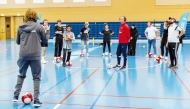 Coaches during the training.