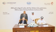 Minister of Transport H E Jassim Saif Ahmed Al Sulaiti (right, standing) witnessing the signing of the MoU by In-charge of Managing QCAA Mohammed Faleh Al Hajri (right, seated) and President of the ICAO Council H E Salvatore Sciacchitano (left, seated) in Doha yesterday.