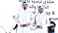 Chief Operations Officer at Msheireb Properties Eng. Faisal Al Malki and Director of Assets Development at Msheireb Properties Eng. Omar Zainal with the awards’ trophies.