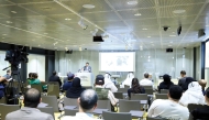 Participants listening to a speech at the event.