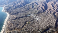 An aerial view of homes destroyed in the Palisades Fire as wildfires cause damage and loss through the LA region on January 13, 2025 in Pacific Palisades, California. Photo by MARIO TAMA / GETTY IMAGES NORTH AMERICA / Getty Images via AFP