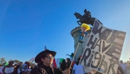 People gather in support of immigrants in Houston, Texas, on February 2, 2025. (Photo by Moisés ءVILA / AFP)
