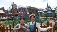 Photo taken on Sept. 12, 2023, shows staff working at a new themed land 