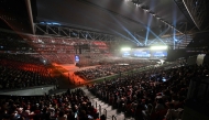 The crowd watches the opening ceremony of the Kai Tak Sports stadium on March 1, 2025. (Photo by Peter Parks / AFP)