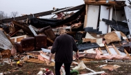 Denise Woodard looks over her destroyed trailer inside of Harmony Hills trailer park on March 15, 2025 in Poplar Bluff, Missouri. (Photo by Brad Vest / GETTY IMAGES NORTH AMERICA / Getty Images via AFP)
