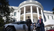 President Donald Trump and Tesla CEO Elon Musk speak to reporters while looking at various models of the company's vehicles on the South Lawn of White House on March 11, 2025. (Photo by Jabin Botsford/The Washington Post)
