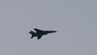A Chinese fighter jet flies above Pingtan island in Fujian province on April 2, 2025. (Photo by Hector Retamal / AFP)
