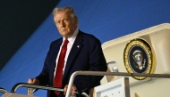 US President Donald Trump steps off Air Force One upon arrival at Palm Beach International Airport in West Palm Beach, Florida on April 3, 2025. (Photo by Mandel NGAN / AFP)
