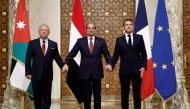 (From left) Jordan's King Abdullah II, Egypt's President Abdel Fattah al-Sisi, and French President Emmanuel Macron pose for a picture during a trilateral summit to discuss the situation in Gaza at the Presidential Palace in Cairo on April 7, 2025. (Photo by Benoit Tessier / POOL / AFP)
