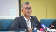 Malaysia's Trade Minister Tengku Zafrul Aziz speaks during a press conference regarding US tariffs in Kuala Lumpur on April 7, 2025. Photo by ARIF KARTONO / AFP.